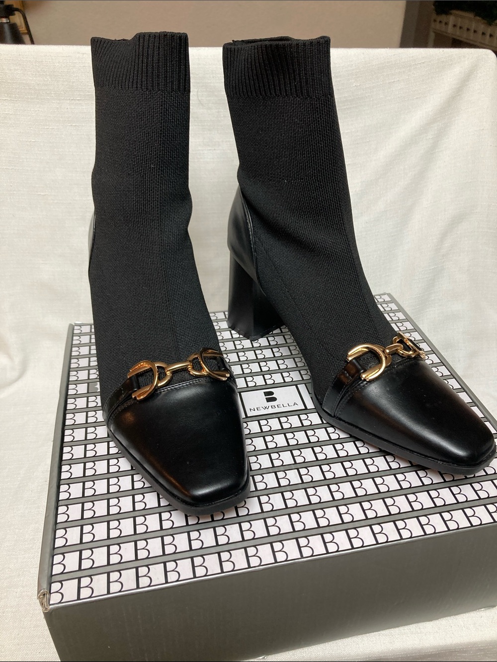 Black Heeled Sock Boot with Gold Bit Accent
